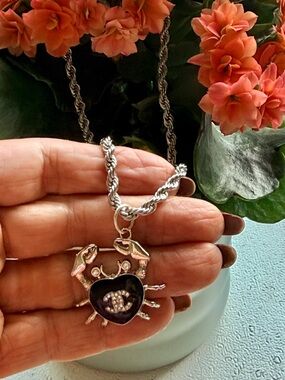 Chanel Silver-Tone stamped 
Crab in black enamel & Chrystal 
on 19" twist rope